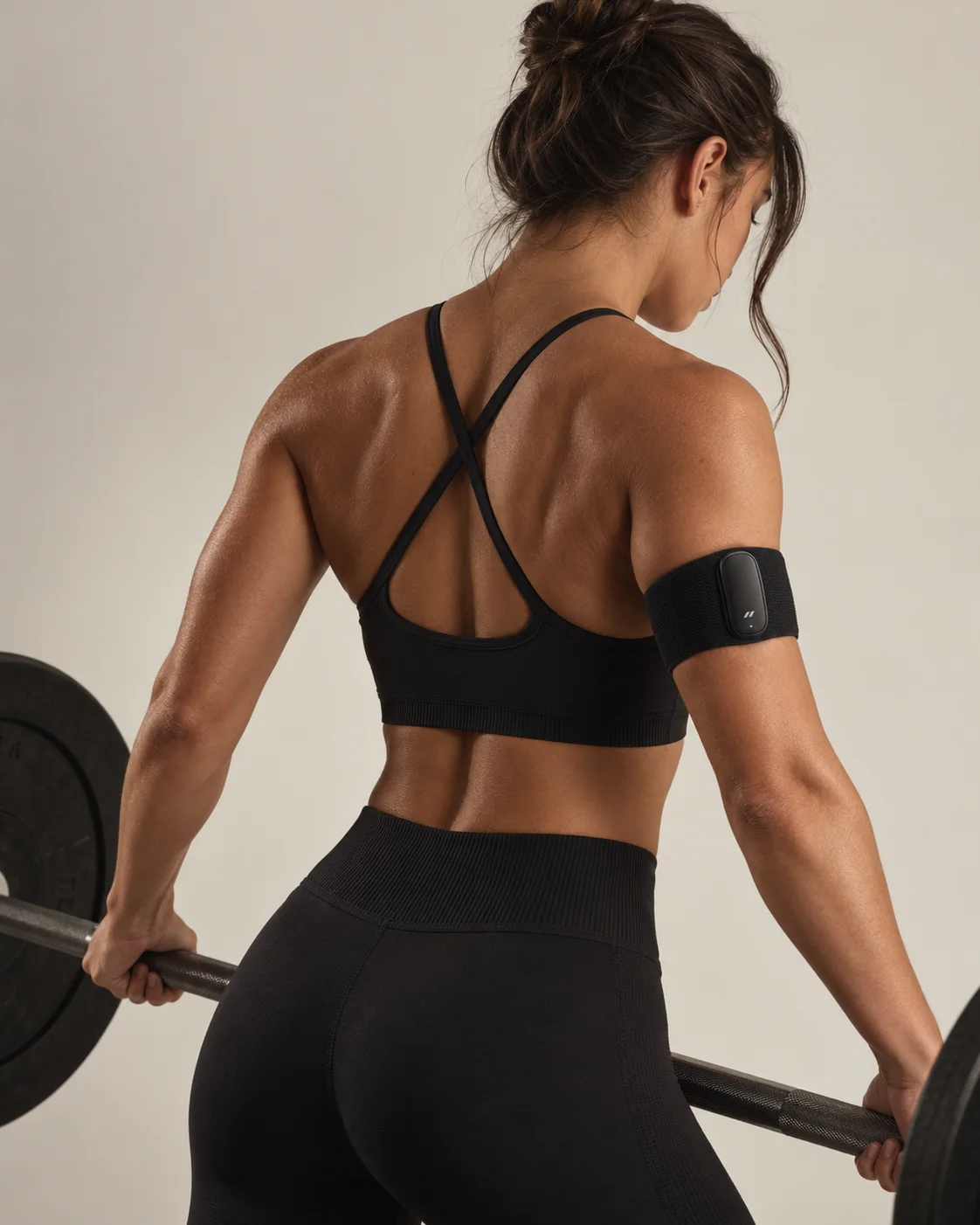Athlete seen from behind mid deadlift wearing the Form band in Onyx